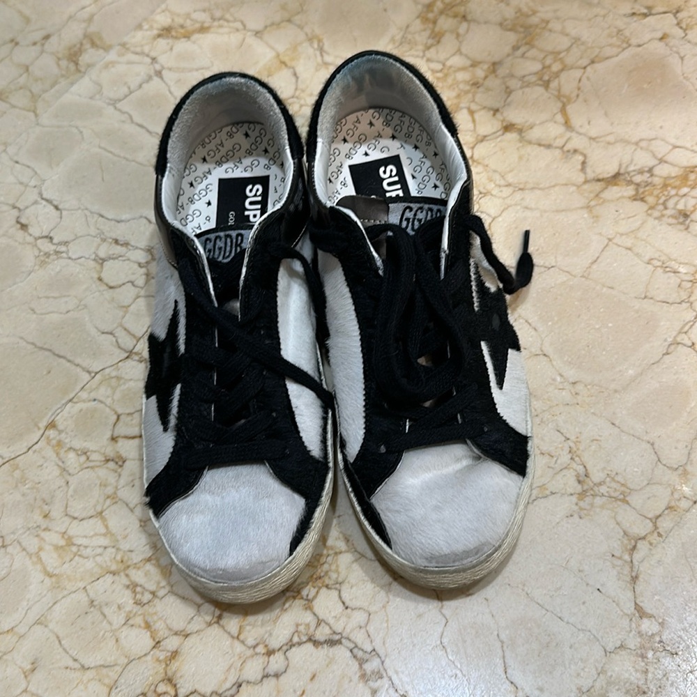 Golden Goose Superstar Sneaker- They fit like a women’s size 6. Dust bag & box